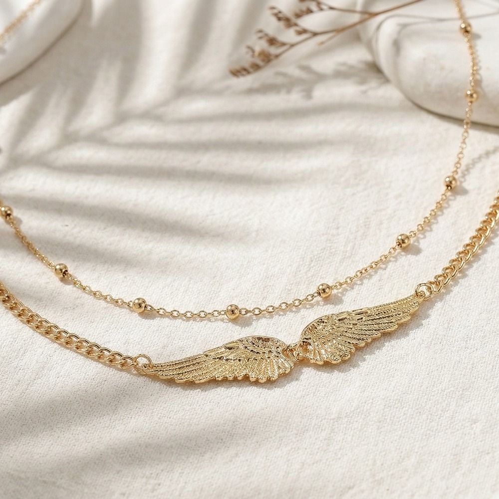 Gift Elegant Double Layer Wing - Body Jewelry Gold ulasan dan harga